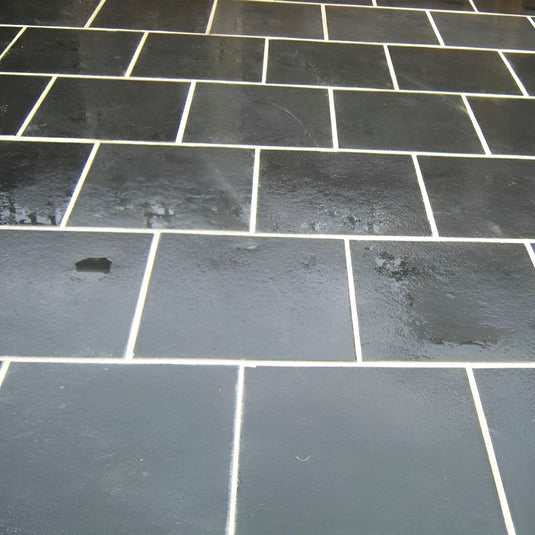 Kota Black Limestone Paving - 600 x 600 x 22mm - Sawn & Riven