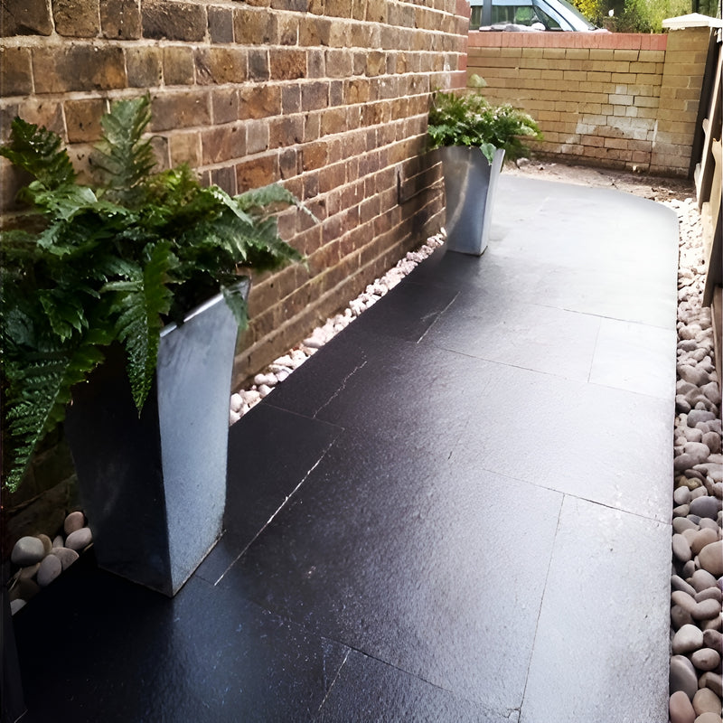 Load image into Gallery viewer, Kota Black Limestone Paving - 600 x 600 x 22mm - Sawn &amp; Riven
