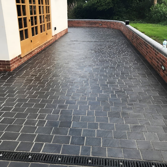 Kota Black Limestone Block Paving - 150 x 150 x 50mm - Sawn, Tumbled & Riven