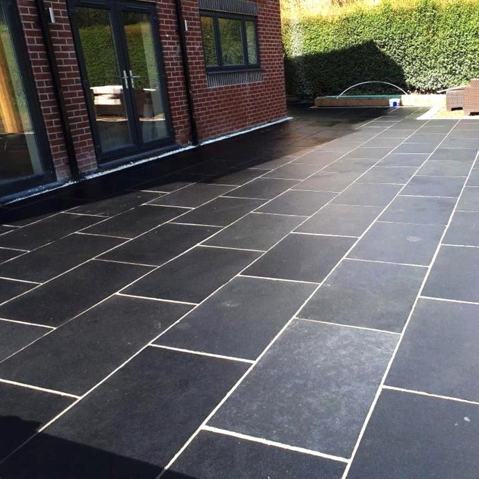 Kota Black Limestone Paving - 900 x 600 x 22mm - Sawn & Riven